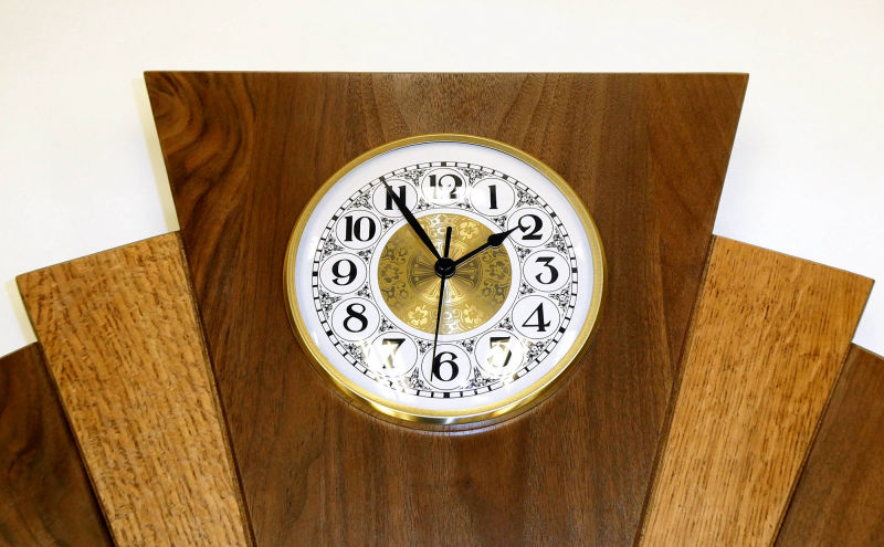 https://www.treeartisan.com/20498S-art-deco-fan-clock-.html